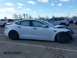 2022 Tesla Model S with VIN 5YJSA1E51NF491493, listed as a IAAI auction lot 41570494 with Not Provided miles and . Bid and sale history available at DreamBid. Image 13.
