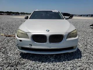 2012 BMW 7 Series 740i with VIN WBAKA4C59CDS99079, listed as a Copart auction lot 53299695 with 142,692 mi miles and Clean Title. Bid and sale history available at carsss.com. Image 5.
