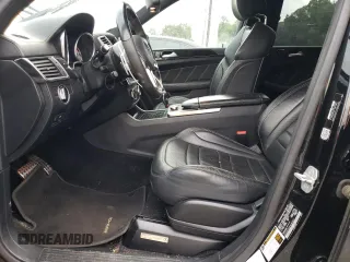 2015 Mercedes-Benz M 63 AMG with VIN 4JGDA7EB0FA440509, listed as a Copart auction lot 73954174 with 74,650 mi miles and Salvage Title. Bid and sale history available at carsss.com. Image 7.