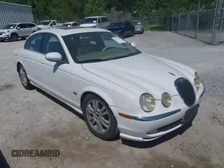 2003 Jaguar S-Type with VIN SAJEA01U93HM89560, listed as a IAAI auction lot 42115289 with 236,905 mi miles and . Bid and sale history available at DreamBid. Image 1.