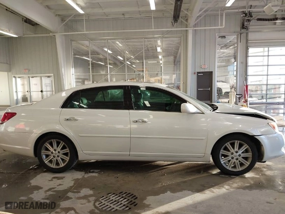 2009 Toyota Avalon XL with VIN 4T1BK36B99U344683, listed as a IAAI auction lot 41011191 with NaN miles. Bid and sale history available at carsss.com. Image 14.
