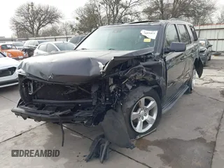 2015 Chevrolet Tahoe LT with VIN 1GNSCBKC5FR504459, listed as a IAAI auction lot 41689405 with 141,783 mi miles and . Bid and sale history available at DreamBid. Image 2.
