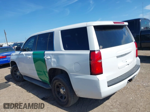 2015 Chevrolet Tahoe Commercial z VIN 1GNLC2EC8FR255526, wystawiony jako IAAI lot #42538320 z przebiegiem 165 502 mil mil oraz . Historia ofert i sprzedaży dostępna na DreamBid. Obrazek 14.