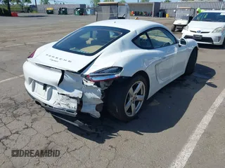 2015 Porsche Cayman with VIN WP0AA2A86FK163282, listed as a IAAI auction lot 42001118 with 101,495 mi miles and . Bid and sale history available at DreamBid. Image 4.