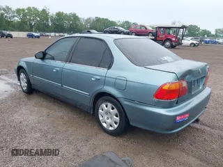 2000 Honda Civic VP z VIN 2HGEJ6612YH575604, wystawiony jako IAAI lot #42395535 z przebiegiem 164 185 mil mil oraz . Historia ofert i sprzedaży dostępna na DreamBid. Obrazek 3.