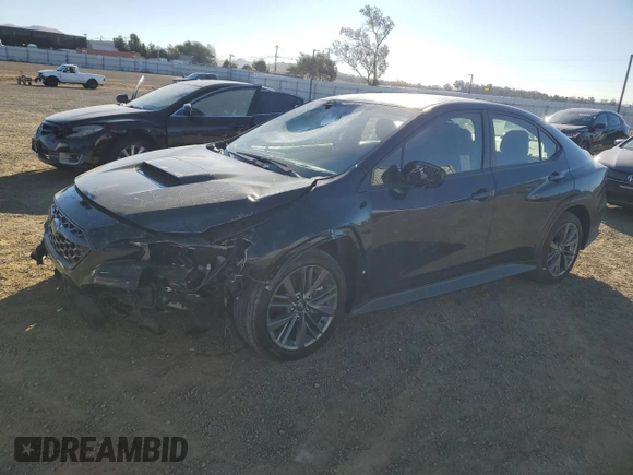2022 Subaru WRX z VIN JF1VBAB68N8017103, wystawiony jako Copart lot #79775184 z przebiegiem 23 398 mil mil oraz Szkody całkowita. Historia ofert i sprzedaży dostępna na DreamBid. Obrazek 1.