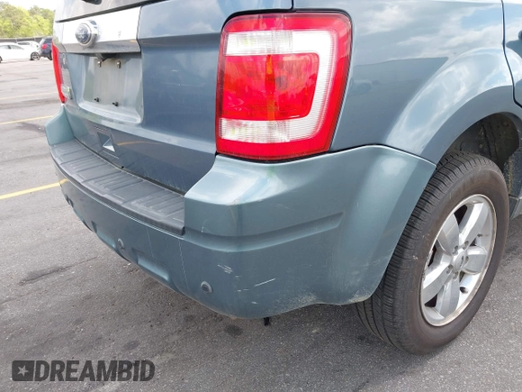 2011 Ford Escape Limited with VIN 1FMCU0E78BKB28559, listed as a IAAI auction lot 41951972 with 213,913 mi miles. Bid and sale history available at carsss.com. Image 13.