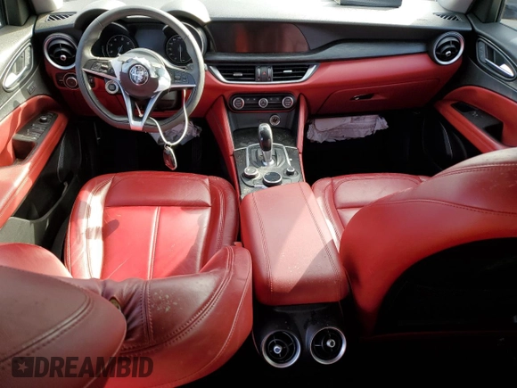 2019 Alfa Romeo Stelvio z VIN ZASPAJAN0K7C36435, wystawiony jako Copart lot #88057385 z przebiegiem Nie podano mil oraz Szkoda całkowita • Salvage title. Historia ofert i sprzedaży dostępna na DreamBid. Obrazek 8.