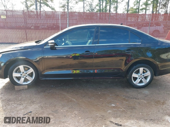 2012 Volkswagen Jetta TDI w/Premium with VIN 3VWLL7AJ2CM426050, listed as a IAAI auction lot 41332817 with 111,996 mi miles and . Bid and sale history available at DreamBid. Image 14.