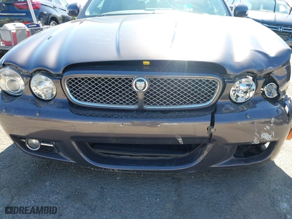 2008 Jaguar XJ with VIN SAJWA71B68SH22853, listed as a IAAI auction lot 41678688 with 76,367 mi miles. Bid and sale history available at carsss.com. Image 17.