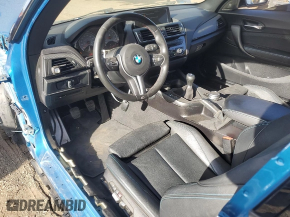 2016 BMW M2 with VIN WBS1H9C52GV351930, listed as a Copart auction lot 86610764 with 55,473 mi miles and Salvage Title. Bid and sale history available at carsss.com. Image 8.