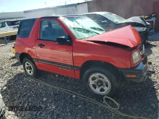 1999 Chevrolet Tracker z VIN 2CNBE1862X6931542, wystawiony jako Copart lot #72216254 z przebiegiem 179 527 mil mil oraz Szkoda całkowita • Salvage title. Historia ofert i sprzedaży dostępna na DreamBid. Obrazek 4.