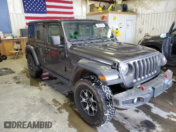 2021 Jeep Wrangler Unlimited Rubicon with VIN 1C4HJXFNXMW732523, listed as a Copart auction lot 40781314 with 23,535 mi miles and Salvage title. Bid and sale history available at DreamBid. Image 4.