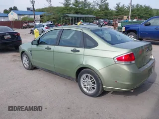 2008 Ford Focus SE with VIN 1FAHP35N58W116555, listed as a IAAI auction lot 42160091 with 162,592 mi miles. Bid and sale history available at carsss.com. Image 3.