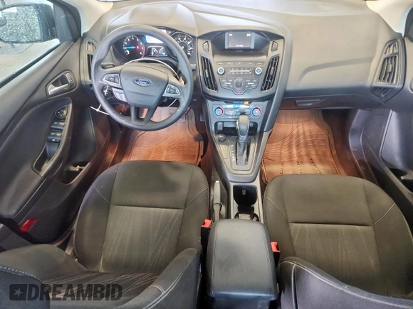2018 Ford Focus SE with VIN 1FADP3FE0JL311760, listed as a Copart auction lot 63621755 with 81,000 mi miles and Salvage title. Bid and sale history available at DreamBid. Image 8.