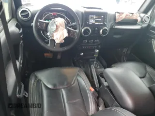 2018 Jeep Wrangler Unlimited Rubicon Recon z VIN 1C4HJWFGXJL840598, wystawiony jako Copart lot #59399595 z przebiegiem 63 298 mil mil oraz Szkoda całkowita • Salvage title. Historia ofert i sprzedaży dostępna na DreamBid. Obrazek 8.