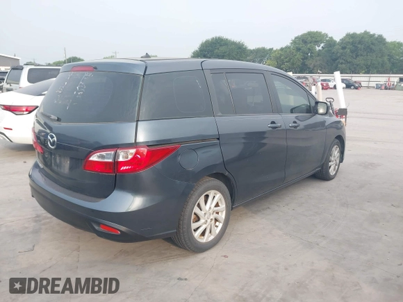 2012 Mazda 5 Sport with VIN JM1CW2BL6C0134921, listed as a IAAI auction lot 42290476 with 128,490 mi miles and . Bid and sale history available at DreamBid. Image 4.