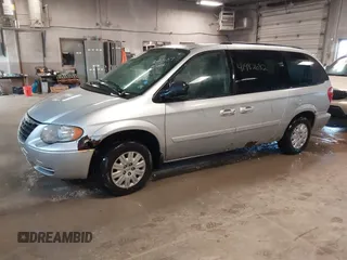 2007 Chrysler Town & Country LWB LX with VIN 2A4GP44R47R354107, listed as a IAAI auction lot 41982682 with 200,643 mi miles. Bid and sale history available at carsss.com. Image 2.