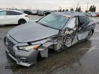 2015 Infiniti Q50 Sport with VIN JN1BV7AP9FM353341, listed as a Copart auction lot 59407675 with 87,181 mi miles and Salvage title. Bid and sale history available at DreamBid. Image 1.