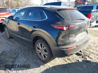 2023 Mazda CX-30 2.5 S Preferred Package with VIN 3MVDMBCM9PM519070, listed as a IAAI auction lot 41351129 with 76,711 mi miles. Bid and sale history available at carsss.com. Image 3.