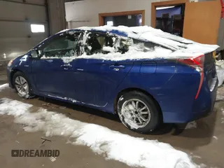 2018 Toyota Prius Two with VIN JTDKBRFU5J3059613, listed as a IAAI auction lot 41581314 with 142,505 mi miles and . Bid and sale history available at carsss.com. Image 3.
