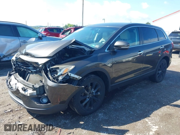 2015 Mazda CX-9 Grand Touring z VIN JM3TB3DV8F0465155, wystawiony jako IAAI lot #42366636 z przebiegiem 125 407 mil mil oraz . Historia ofert i sprzedaży dostępna na DreamBid. Obrazek 17.