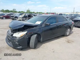 2015 Toyota Camry XLE with VIN 4T1BF1FK7FU037419, listed as a IAAI auction lot 42053259 with 118,453 mi miles and . Bid and sale history available at DreamBid. Image 2.