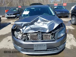 2013 Volkswagen Passat SE z VIN 1VWBN7A3XDC113600, wystawiony jako IAAI lot #41826962 z przebiegiem 121 188 mil mil oraz . Historia ofert i sprzedaży dostępna na DreamBid. Obrazek 13.