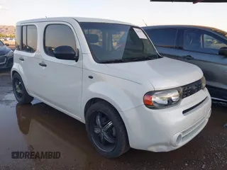 2009 Nissan Cube SL z VIN JN8AZ28R99T102860, wystawiony jako IAAI lot #42441475 z przebiegiem 151 466 mil mil oraz . Historia ofert i sprzedaży dostępna na DreamBid. Obrazek 1.