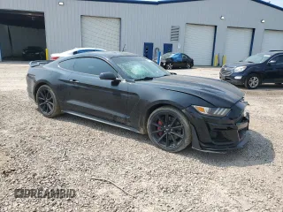 2016 Ford Mustang GT with VIN 1FA6P8CFXG5326279, listed as a Copart auction lot 59100565 with 52,972 mi miles and Salvage title. Bid and sale history available at DreamBid. Image 4.