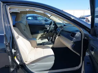 2013 Toyota Camry L with VIN 4T4BF1FK1DR308848, listed as a IAAI auction lot 42014028 with 192,645 mi miles. Bid and sale history available at carsss.com. Image 5.