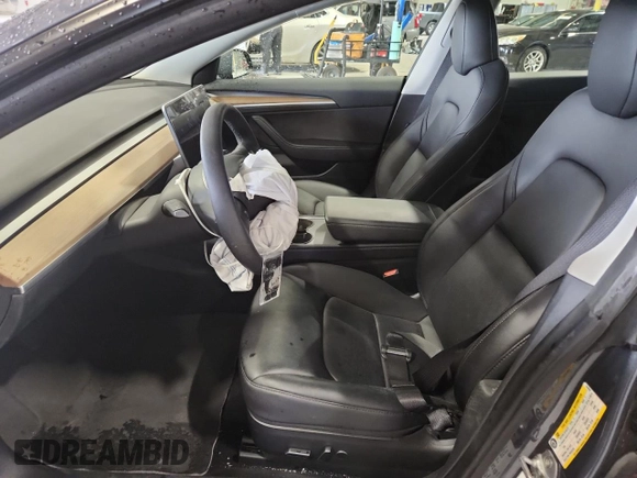 2023 Tesla Model 3 with VIN 5YJ3E1EA4PF554840, listed as a Copart auction lot 63731175 with Not provided miles and Salvage title. Bid and sale history available at DreamBid. Image 7.