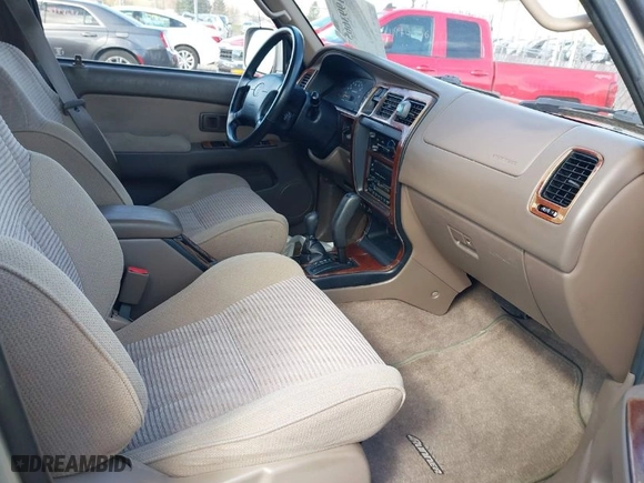 1998 Toyota 4Runner SR5 with VIN JT3HN86RXW0187219, listed as a IAAI auction lot 41993665 with 152,008 mi miles. Bid and sale history available at carsss.com. Image 5.