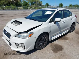 2015 Subaru WRX Premium with VIN JF1VA1D61F8815122, listed as a IAAI auction lot 42042491 with 134,158 mi miles and . Bid and sale history available at DreamBid. Image 2.