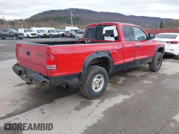1998 Dodge Dakota SLT with VIN 1B7GG22Y1WS519712, listed as a IAAI auction lot 41913541 with 232,892 mi miles. Bid and sale history available at carsss.com. Image 4.