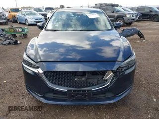 2020 Mazda 6 Sport with VIN JM1GL1UM5L1519519, listed as a IAAI auction lot 41920571 with 59,378 mi miles and . Bid and sale history available at DreamBid. Image 13.