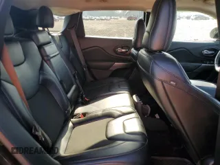 2019 Jeep Cherokee Latitude Plus z VIN 1C4PJLLB9KD176454, wystawiony jako Copart lot #59999685 z przebiegiem 148 113 mil mil oraz Szkoda całkowita • Salvage title. Historia ofert i sprzedaży dostępna na DreamBid. Obrazek 11.