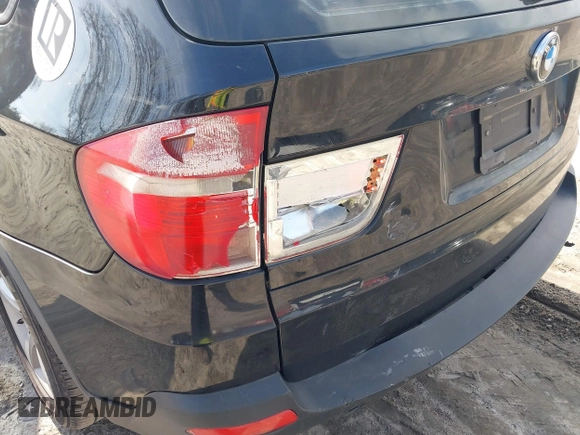 2009 BMW X5 30i with VIN 5UXFE43549L038836, listed as a IAAI auction lot 41500108 with 237,230 mi miles. Bid and sale history available at carsss.com. Image 6.