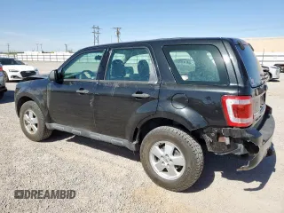 2011 Ford Escape XLS with VIN 1FMCU0C79BKC04115, listed as a Copart auction lot 56982375 with 193,078 mi miles and Salvage title. Bid and sale history available at DreamBid. Image 2.