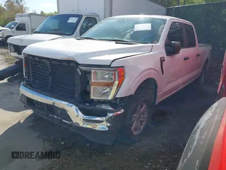 2021 Ford F-150 XL with VIN 1FTFW1E82MKD23506, listed as a IAAI auction lot 41876760 with 71,387 mi miles. Bid and sale history available at carsss.com. Image 2.