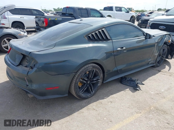 2016 Ford Mustang EcoBoost z VIN 1FA6P8TH0G5289907, wystawiony jako IAAI lot #42057565 z przebiegiem 129 917 mil mil oraz . Historia ofert i sprzedaży dostępna na DreamBid. Obrazek 4.