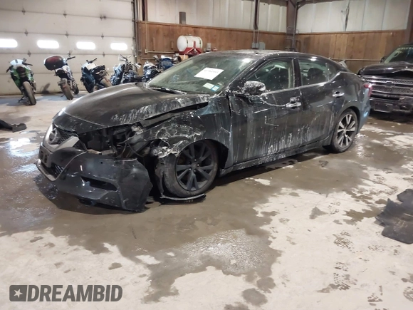 2017 Nissan Maxima SV with VIN 1N4AA6AP6HC451921, listed as a IAAI auction lot 41384995 with 74,160 mi miles and . Bid and sale history available at DreamBid. Image 18.
