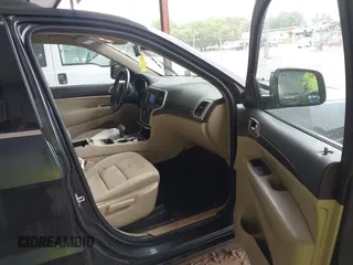2014 Jeep Grand Cherokee Laredo with VIN 1C4RJEAG6EC206748, listed as a IAAI auction lot 42244421 with 198,217 mi miles and . Bid and sale history available at DreamBid. Image 5.
