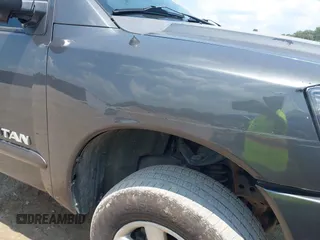 2011 Nissan Titan Pro-4X with VIN 1N6AA0CC3BN313442, listed as a IAAI auction lot 42582789 with 189,582 mi miles and . Bid and sale history available at DreamBid. Image 6.