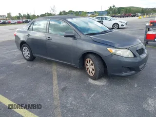 2009 Toyota Corolla with VIN 1NXBU40E19Z016810, listed as a IAAI auction lot 42133609 with 122,741 mi miles. Bid and sale history available at carsss.com. Image 1.