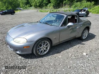 2002 Mazda MX-5 Miata Cloth with VIN JM1NB353520224582, listed as a Copart auction lot 63669835 with 88,455 mi miles and Salvage title. Bid and sale history available at DreamBid. Image 1.
