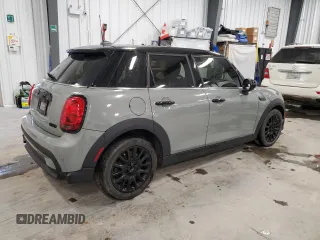 2023 MINI Hardtop 4 Door Cooper Classic z VIN WMW33DK0XP2S54786, wystawiony jako Copart lot #87873415 z przebiegiem 50 956 mil mil oraz Szkoda całkowita • Salvage title. Historia ofert i sprzedaży dostępna na DreamBid. Obrazek 3.