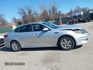 2016 Kia Optima LX with VIN 5XXGT4L37GG084538, listed as a IAAI auction lot 41784807 with 128,928 mi miles. Bid and sale history available at carsss.com. Image 13.