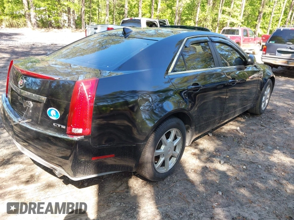 2009 Cadillac CTS RWD w/1SB with VIN 1G6DU57V590105458, listed as a IAAI auction lot 42139093 with 105,983 mi miles. Bid and sale history available at carsss.com. Image 4.
