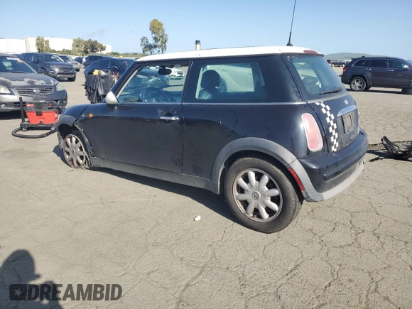 2004 MINI Hardtop with VIN WMWRC33464TJ62893, listed as a Copart auction lot 51905565 with 141,958 mi miles and Salvage Title. Bid and sale history available at DreamBid. Image 2.